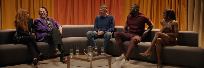 A screengrab from ‘Mel Made Me Do It’. From left to right: Zeze Mills, Jonathan Ross, Louis Theroux, Stormzy, and Dina Asher-Smith.