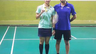 Malvika-with-her-coach-Sanjay-Mishra-after-beating-Saina-Nehwal-at-the-2022-India-Open-1jpeg