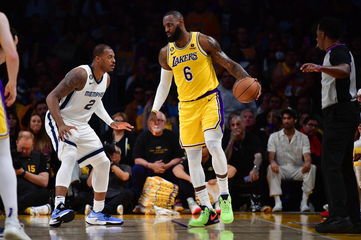 James, Lakers hold off Memphis in overtime