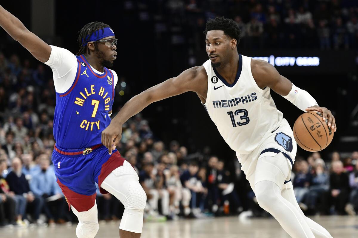 Reggie Jackson of the Denver Nuggets drives to the basket during