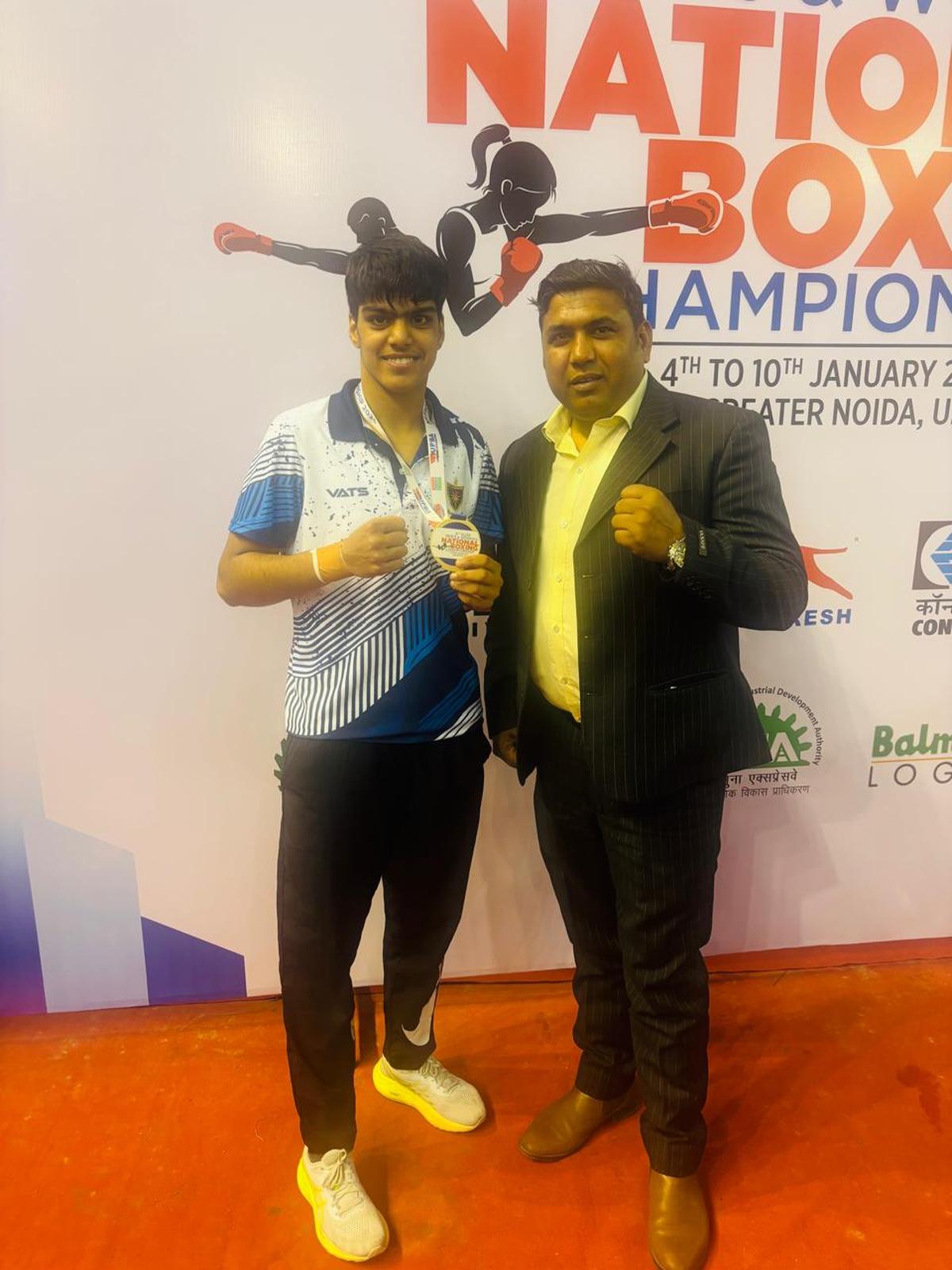 Priya and her coach Mahavir.