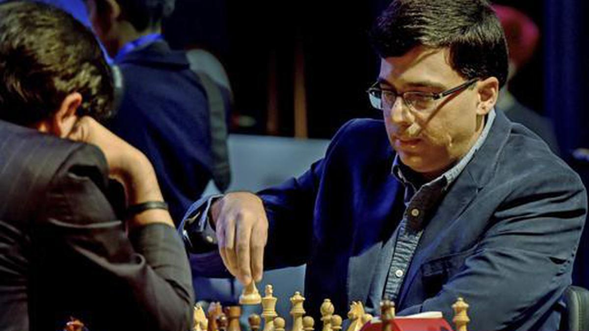 Five share lead after Viswanathan Anand holds Caruana