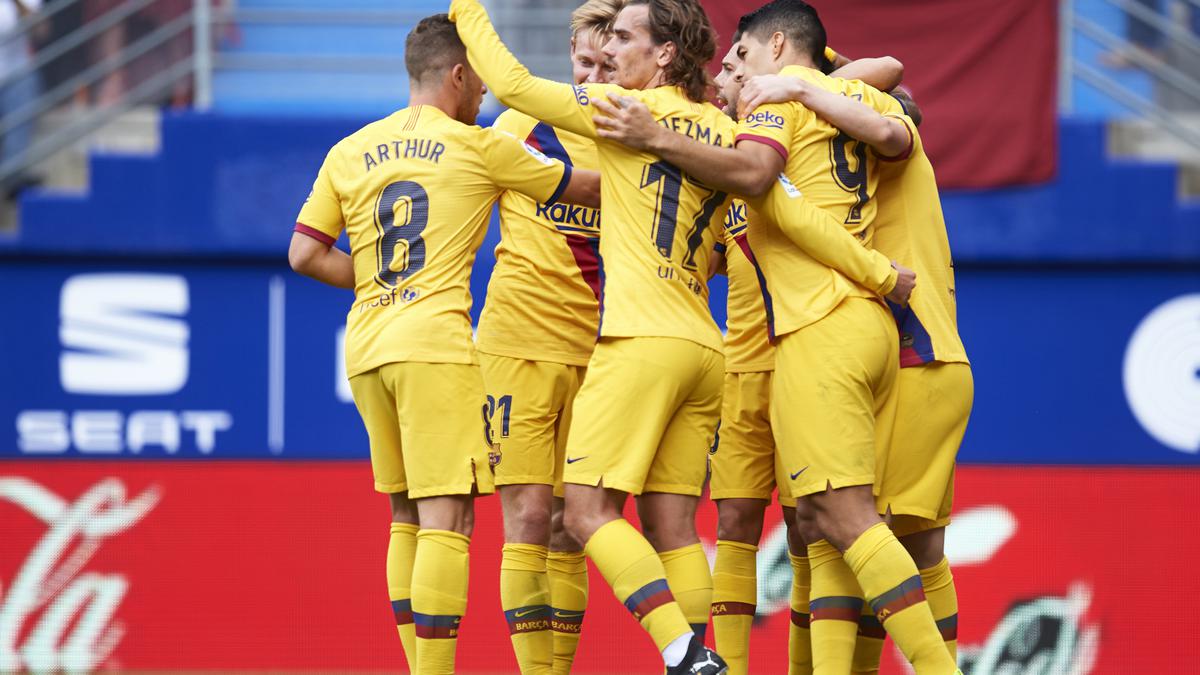 Griezmann, Messi and Suarez score as Barca beats Eibar 3-0