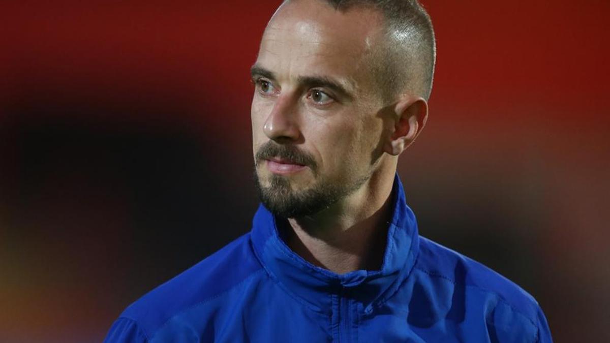 Ex-England women's coach Mark Sampson charged with racism