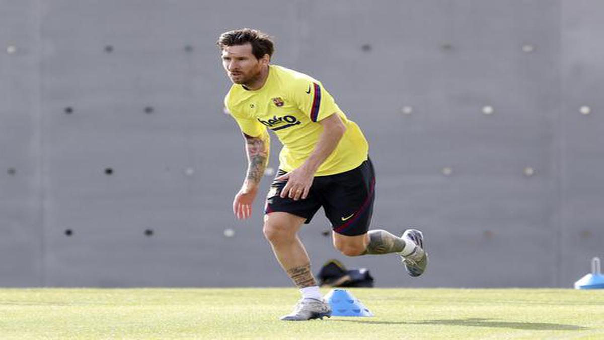 Lionel Messi returns to Barcelona training