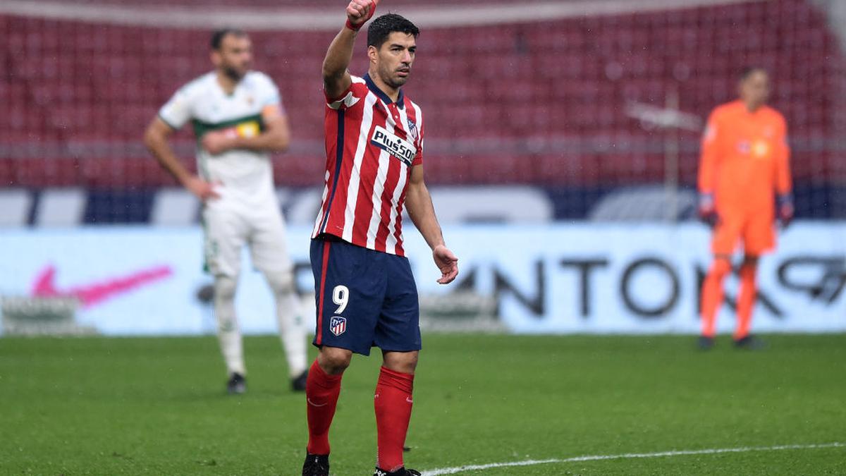 Suarez nets double as Atletico goes clear at the top - football news - sportstar