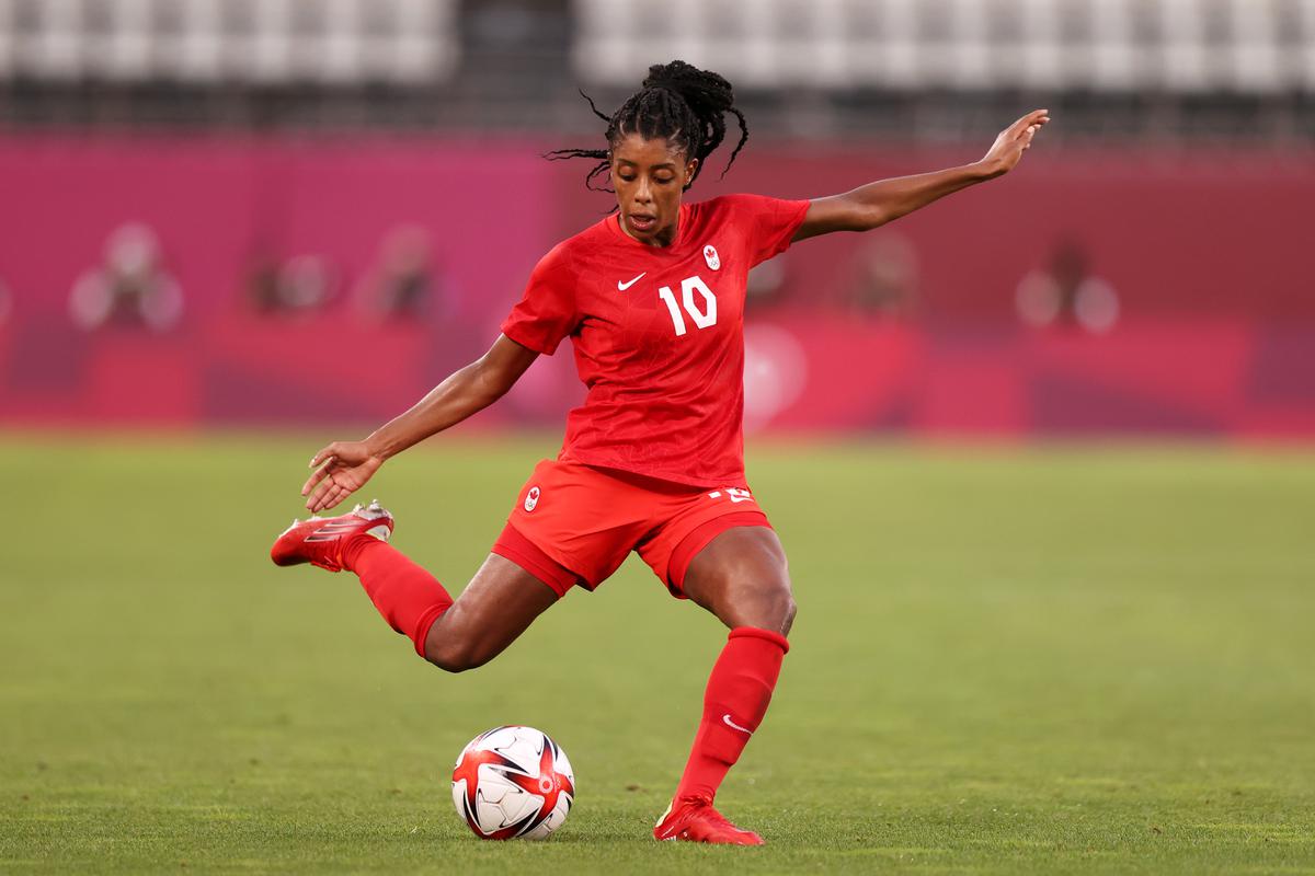 Ashley Lawrence of Team Canada makes a pass during the Women’s Semi-Final match between USA and Canada in the Tokyo Olympics. 