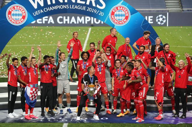 Hans-Dieter Flick, then Head Coach of FC Bayern Munich celebrates with the UEFA Champions League Trophy following his team’s victory in the UEFA Champions League Final match between Paris Saint-Germain and Bayern Munich at Estadio do Sport Lisboa e Benfica on August 23, 2020 in Lisbon, Portugal.