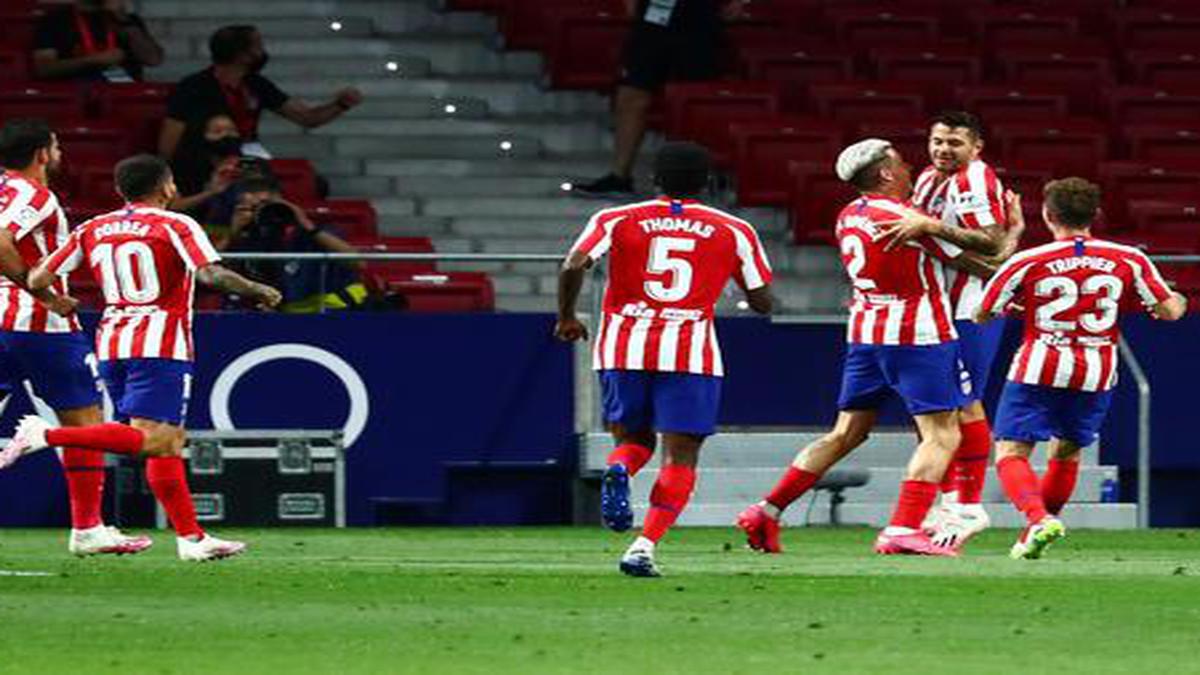 Atletico goes third in La Liga with nervy win over Valladolid