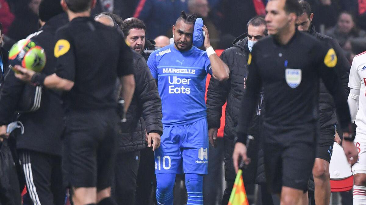 Lyon docked one point after crowd trouble in Marseille game