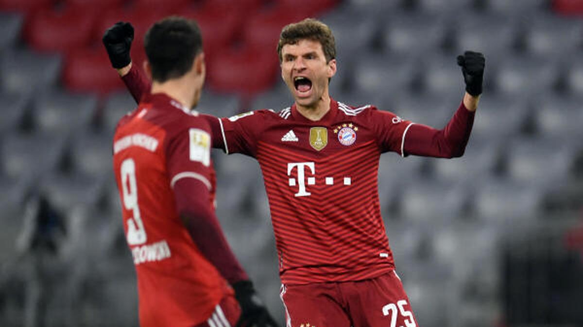 Mueller scores in 400th game as Bayern crush Wolfsburg