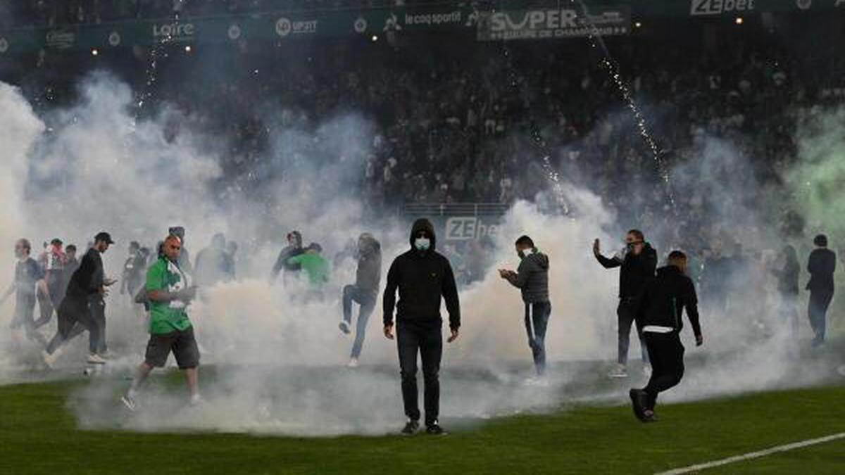 Fans invade field as 10-time champ Saint-Etienne relegated