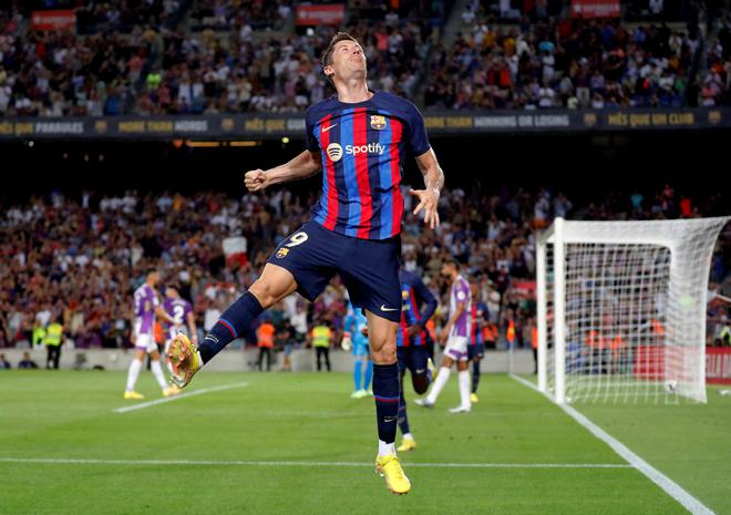 Barcelona’s Robert Lewandowski celebrates scoring the side’s third goal against Valladolid.   