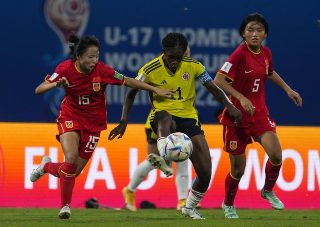 Match winner: Linda Caicedo (centre) fights for the ball with Yu Xingyue (left) during a World Cup contest between China and Colombia in Navi Mumbai. Caicedo scored four goals in the tournament, winning the bronze boot and the silver ball.