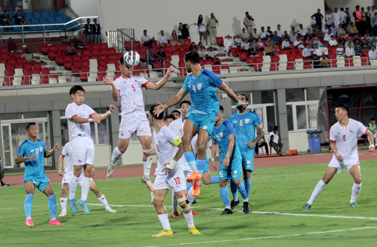 Mongolia players (white) tries to block the strike by India in the Hero Intercontinental Cup 2023 at the Kalinga stadium in Bhubaneswar.