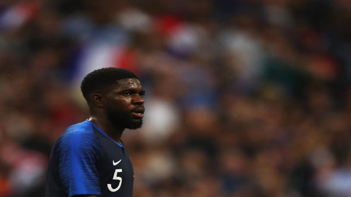 Slam dunk? - Umtiti sees funny side of handball in World Cup opener ...