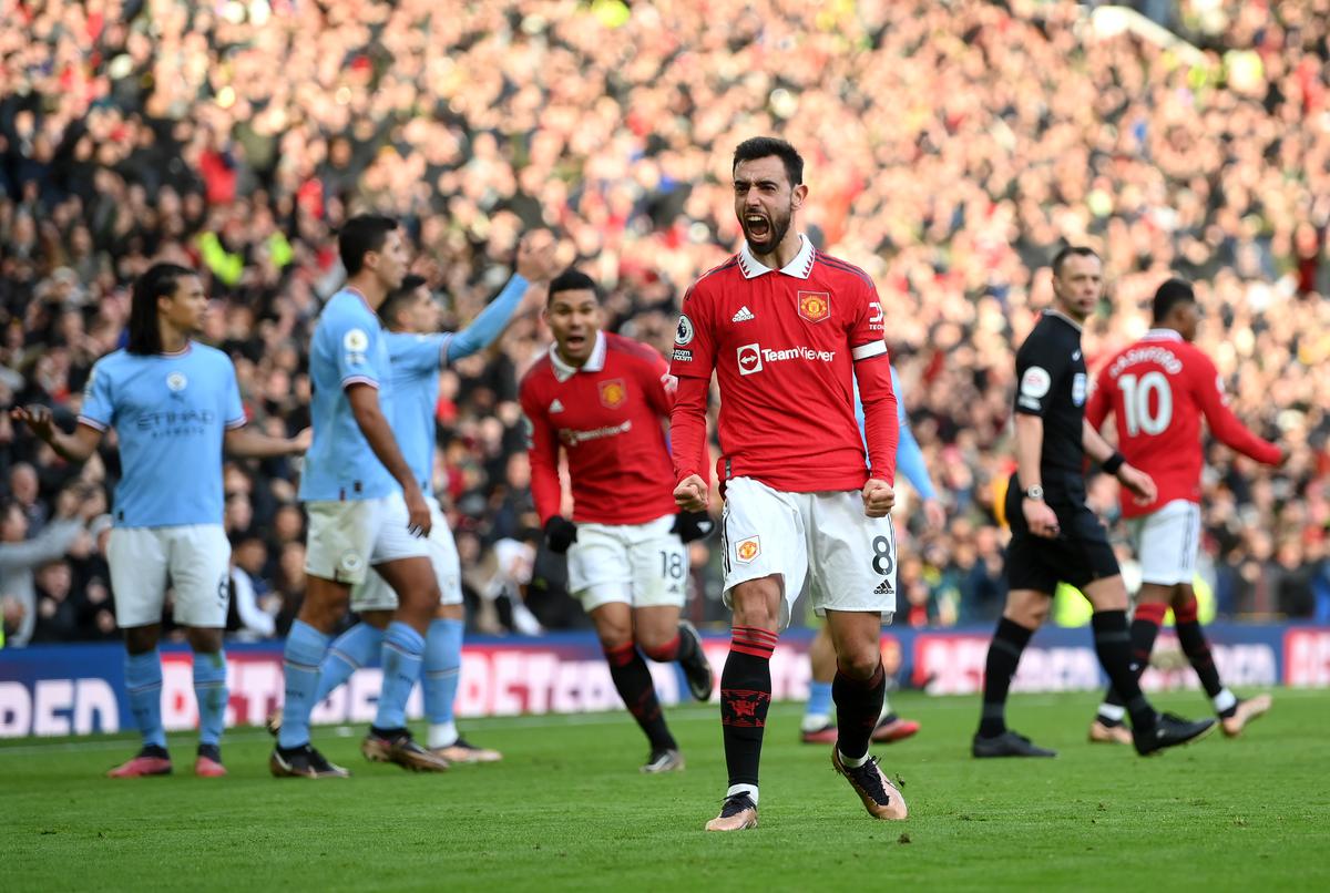 Bruno Fernandes of Manchester United celebrates after scoring the team’s first goal during the Premier League match between Manchester United and Manchester City at Old Trafford on January 14, 2023 in Manchester, England.