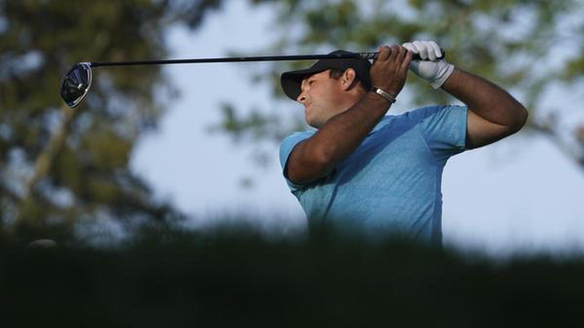 Patrick Reed grabs US Open halfway lead, Tiger Woods misses cut