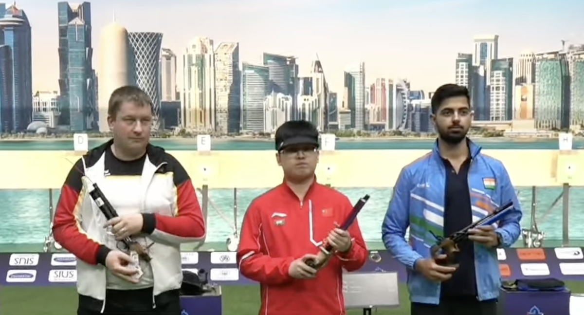 The men’s 10m air pistol medallists. Samrat Rana can be seen on the right.