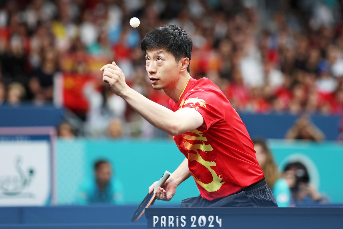 Long Ma of Team People’s Republic of China competes in Match 1 against Anton Kallberg and Kristian Karlsson of Team Sweden​​ (not pictured) during the Table Tennis Men’s Team Gold Medal match between Team People’s Republic of China and Team Sweden on day fourteen of the Olympic Games Paris 2024 at South Paris Arena on August 09, 2024 in Paris, France.