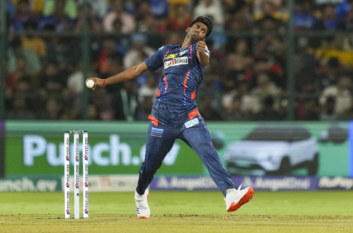 Lucknow Super Giants’ Mayank Yadav bowls a delivery during the Indian Premier League (IPL) 2024 T20 cricket match between Royal Challengers Bengaluru and Lucknow Super Giants.