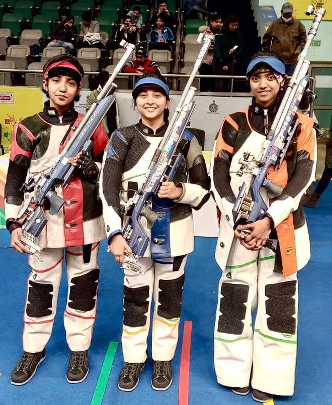 Narmada Nithin, champion Mehuli Ghosh and Elavenil Valarivan (left to right) in air rifle in the National shooting trials in Delhi on Wednesday.