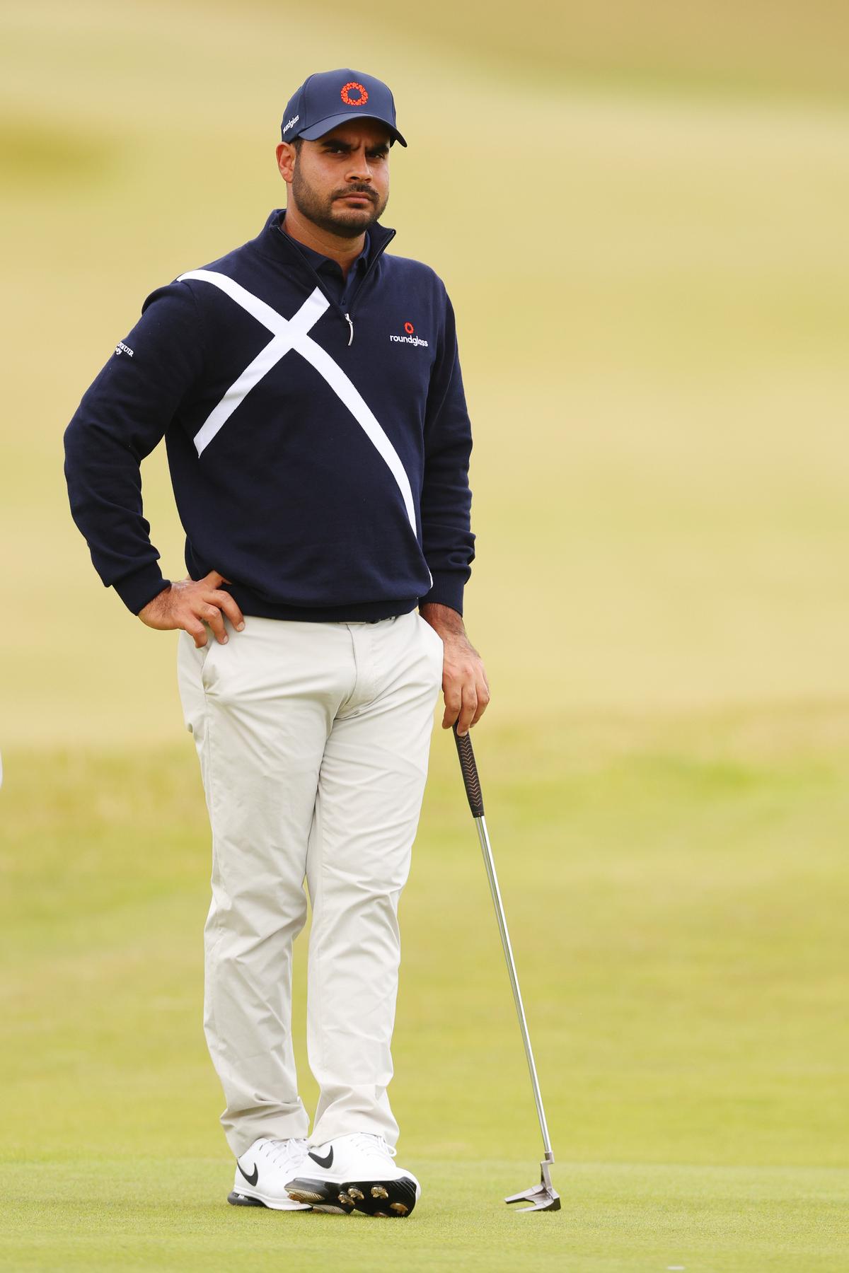 Shubhankar Sharma of India lines up putt on the third green during day one of the Genesis Scottish Open.