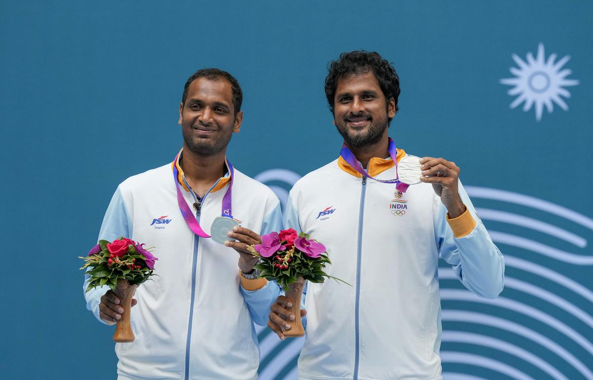 Hangzhou: India’s Ramkumar Ramanathan (L) and Saketh Myneni pose with their silver medal during the presentation ceremony of men’s doubles final tennis event at the 19th Asian Games, in Hangzhou, China.