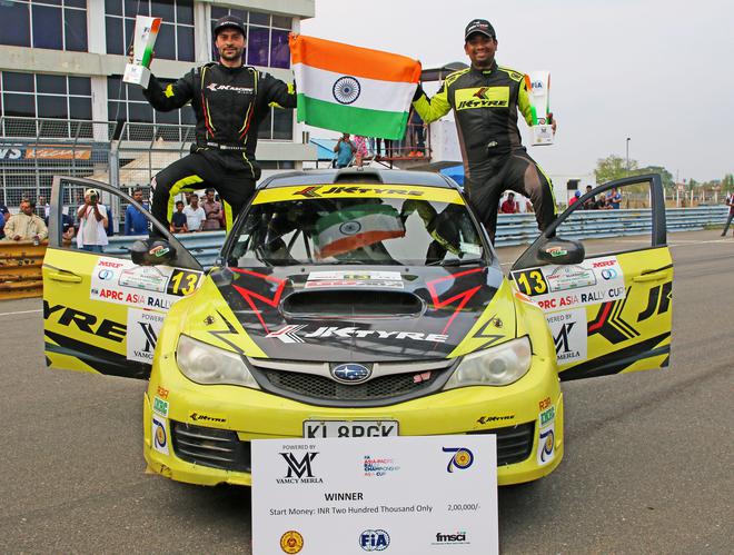 Gaurav Gill (left) and co-driver Aniruddha Rangnekar celebrating victory in the second round of the FIA-APRC.