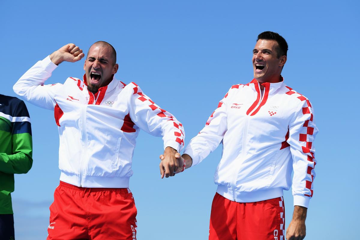 RIO DE JANEIRO, BRAZIL - AUGUST 11:  (L-R) Martin Sinkovic of Croatia and Valent Sinkovic of Croatia celebrate winning gold medal in the Men's Double Sculls Finals on Day 6 of the 2016 Rio Olympics at Lagoa Stadium on August 11, 2016 in Rio de Janeiro, Brazil.  (Photo by Matthias Hangst/Getty Images)