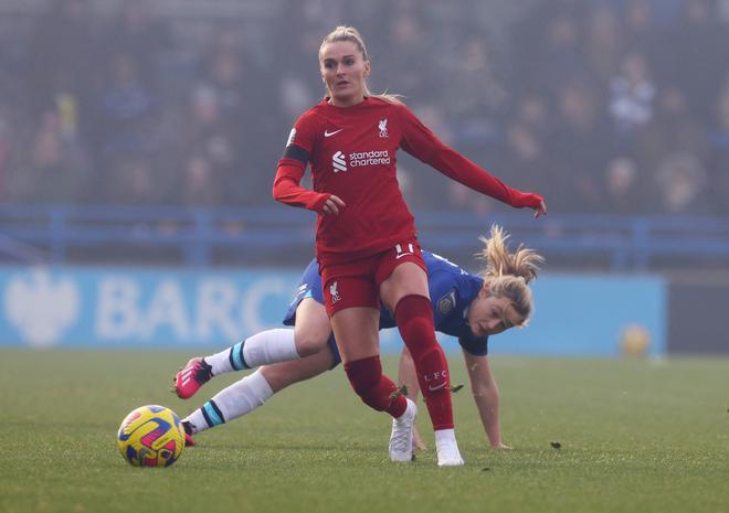 Liverpool’s Melissa Lawley in action with Chelsea’s Erin Cuthbert before the match was abandoned due to the conditions of the pitch.