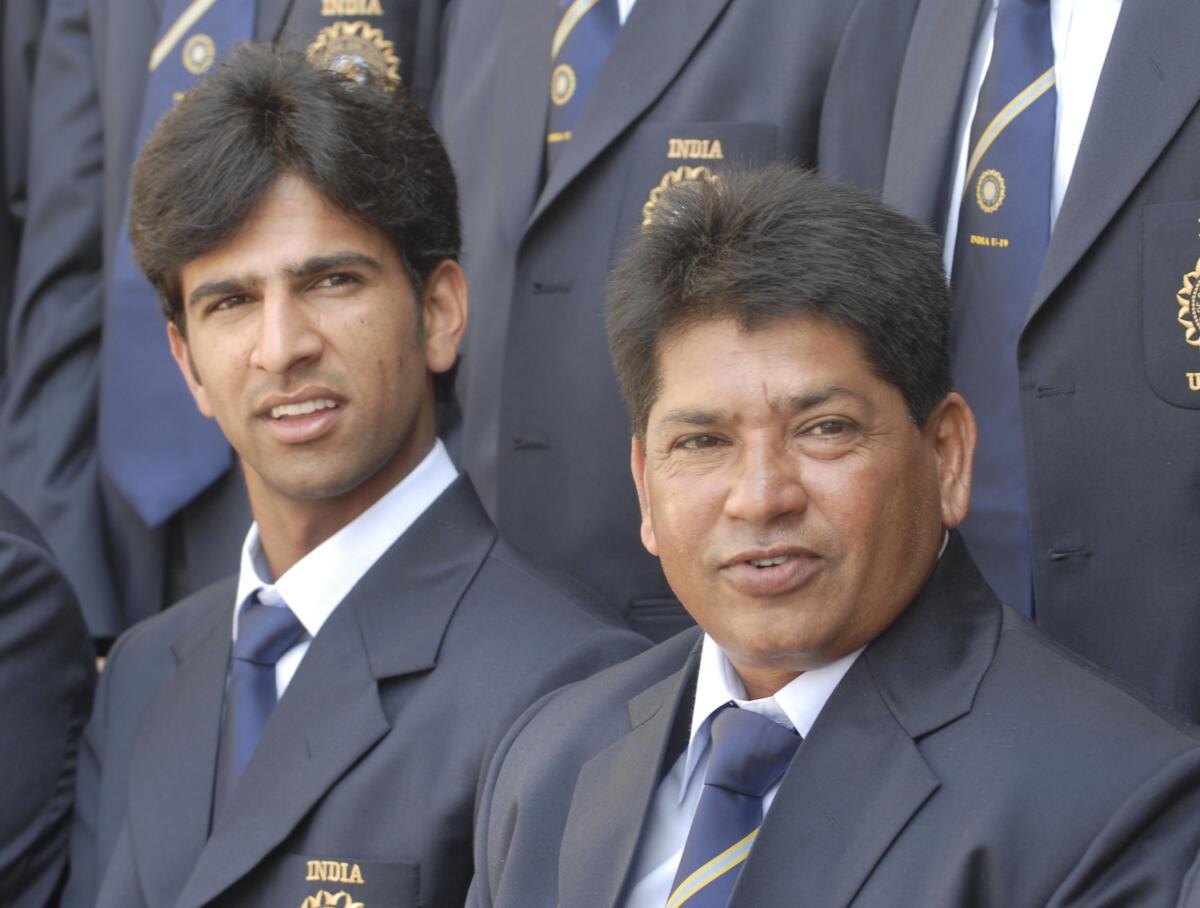 Indian Under-19 cricket team captain Ashok Menaria (left) with coach Chandrakant Pandit in Mumbai on December 19, 2009 prior to their departure for the tri-series in South Africa and the ICC Under-19 World Cup 2010 in New Zealand.