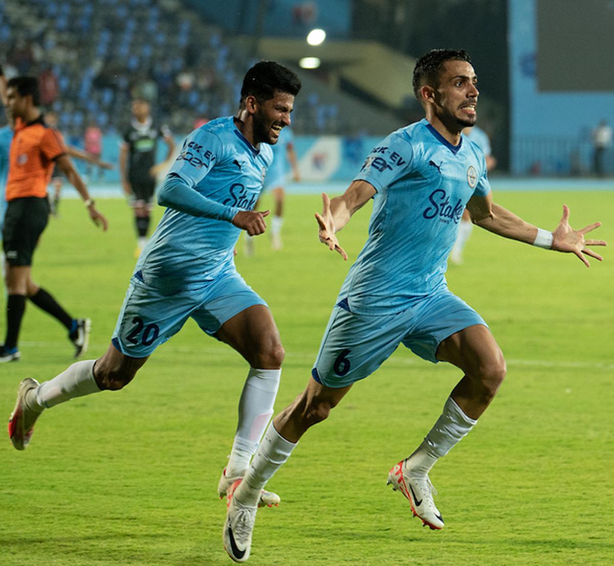 Vikram Partap Singh of Mumbai City FC celebrates after scoring a goal.