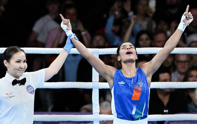 Boxer Nikhat Zareen reacts after winning her bout against Carly McNaul of Northern Ireland in the final of the women’s light flyweight event on Sunday. 