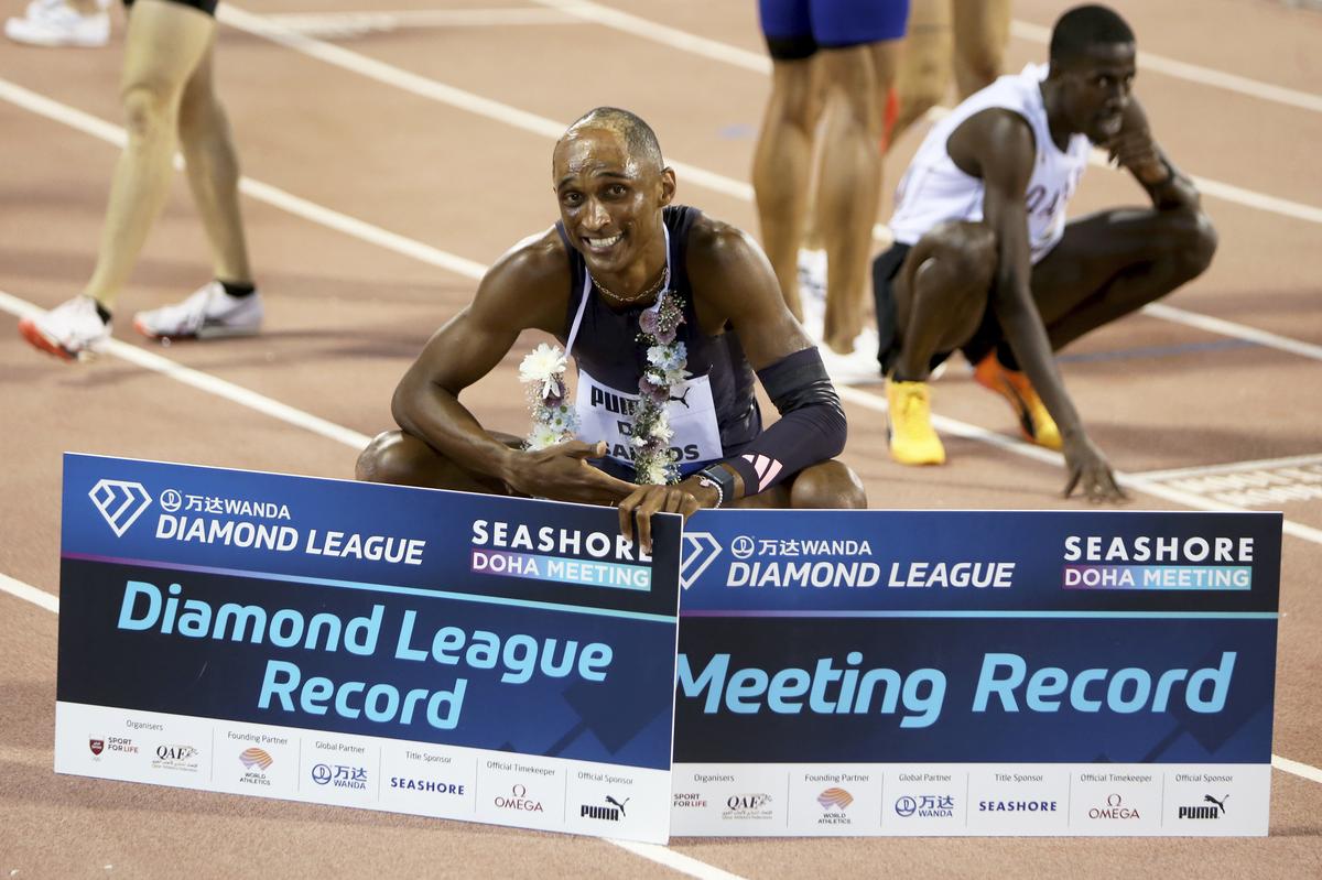 Alison dos Santos, of Brazil, poses after winning the men’s 400 meters hurdles during the Diamond League athletics meet. 