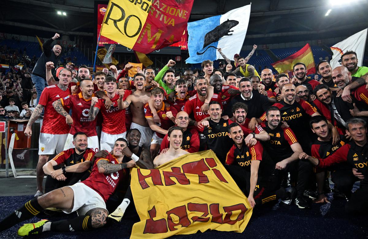 AS Roma players celebrate after the match.