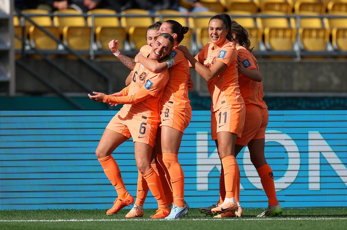 Jill Roord (1st L) of Netherlands celebrates with teammates after scoring her team’s first goal.