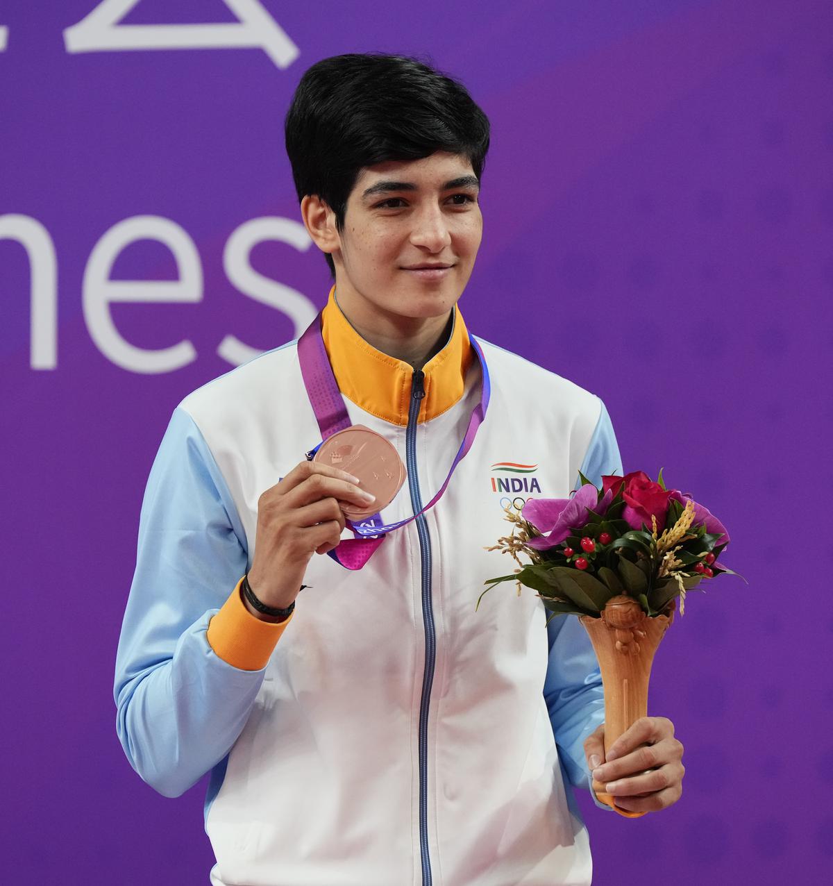 Indian boxer Parveen Hood won bronze in the women’s 57kg category at the Asian Games in Hangzhou.