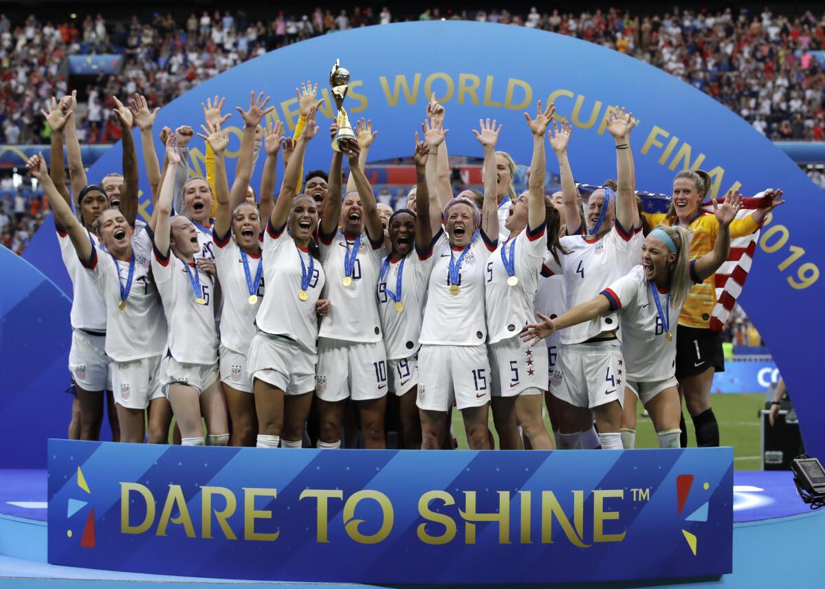 The USWNT celebrates lifting the 2019 Women’s World Cup.