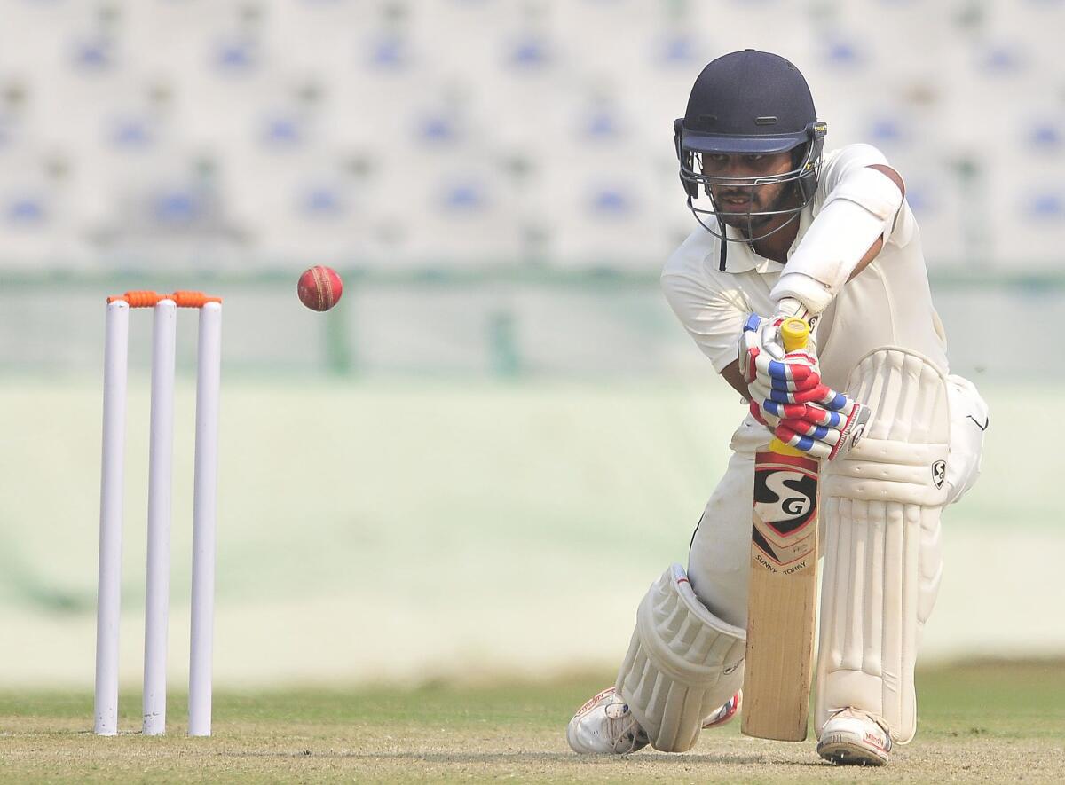 Delhi’s Milind Kumar plays a shot on the third day of the Ranji Trophy Group B match against Orissa in Mohali in 2016. 