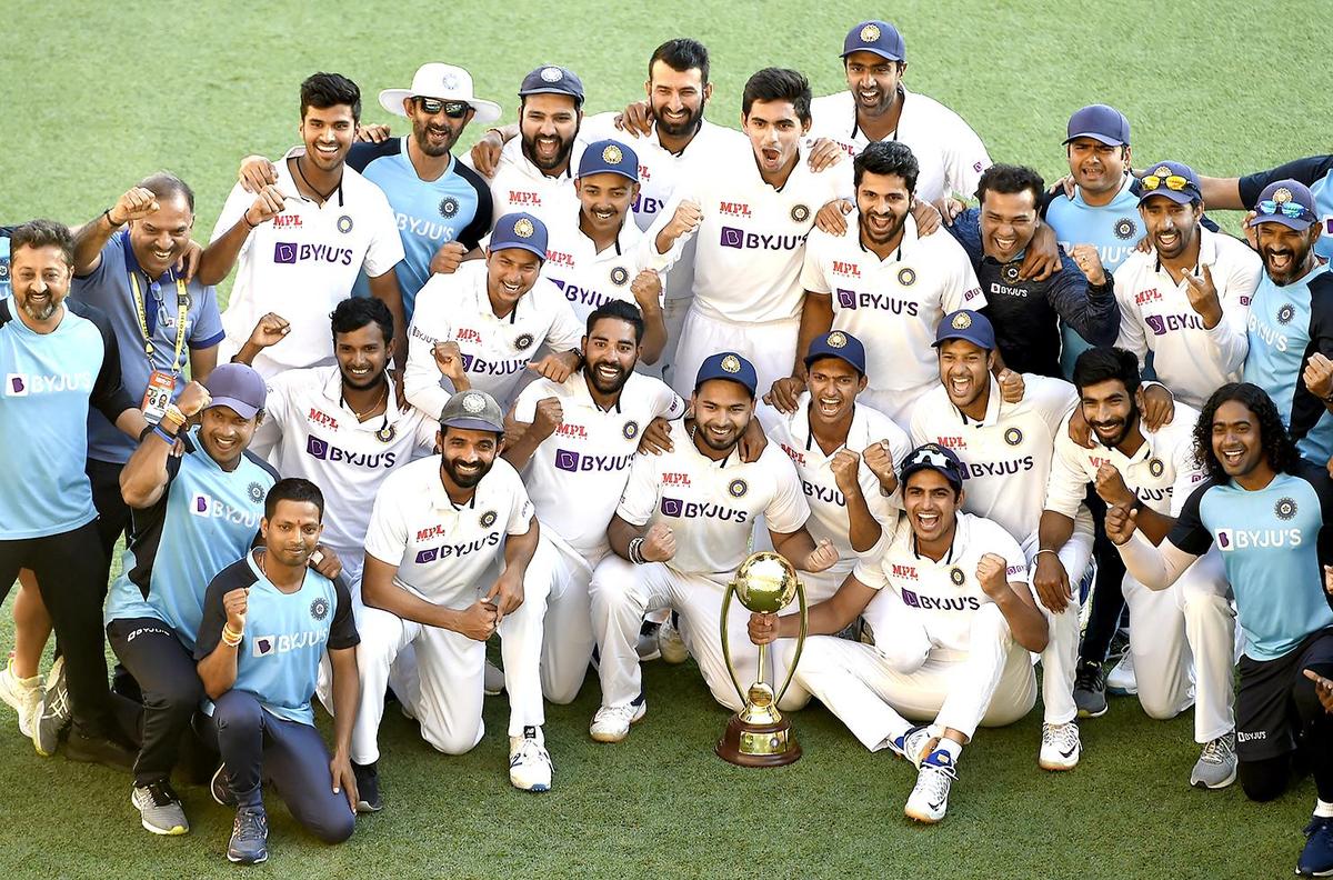 Kartik Tyagi (standing, centre) seen during the Indian team's celebrations post the historic win over Australia at The Gabba on January 19, 2021.