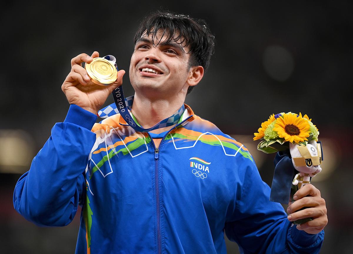 Gold medallist Neeraj Chopra stands on the podium after winning the Men’s Javelin Throw final at Olympic Stadium on August 7, 2021 in Tokyo, Japan.