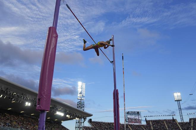 Nina Kennedy of Australia makes a clearance to win the gold medal in the women’s pole vault final on Tuesday. 