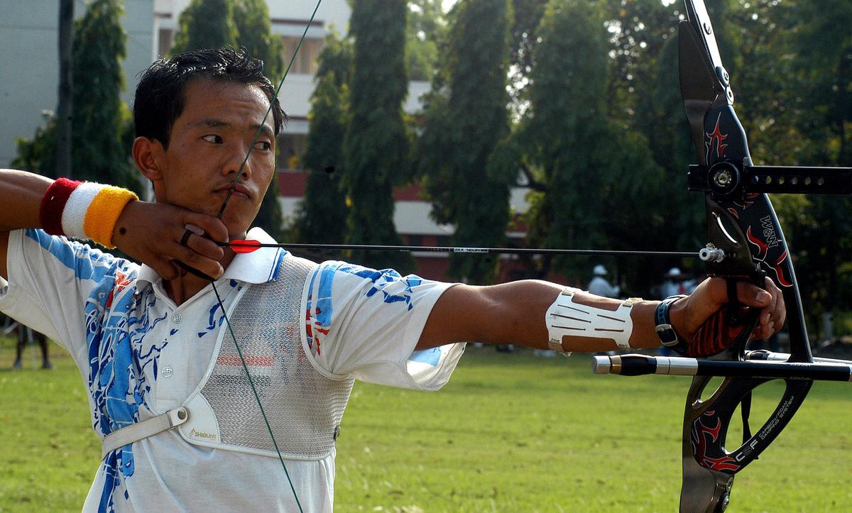 Ageless wonder: Tarundeep Rai practises at an archery ground in 2004. Rai’s contemporaries have turned coaches while he remains determined on his quest for an Olympic medal. 