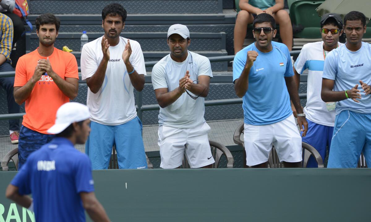  Leander Paes, Rohan Bopanna, Yuki Bhambri along with other teammates cheering India’s Somdev Devvarman during his match against Jiri Vesely of Czech Republic in the second singles rubber of the Davis Cup World Group play-off tie in New Delhi on September 18, 2015. 