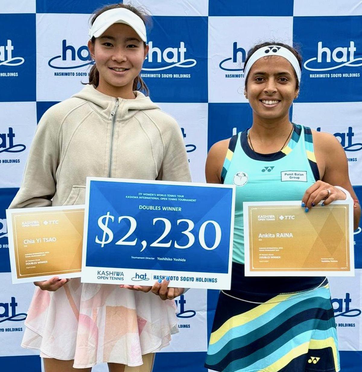 Doubles champions Chia Yi Tsao and Ankita Raina in the ITF women’s tennis tournament in Japan on Saturday.