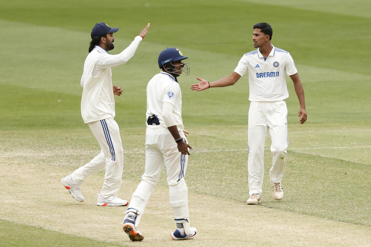 FILE PHOTO: Tanush Kotian of India A celebrates the wicket of Ollie Davies of Australia A during the game between Australia A and India A at Melbourne Cricket Ground.