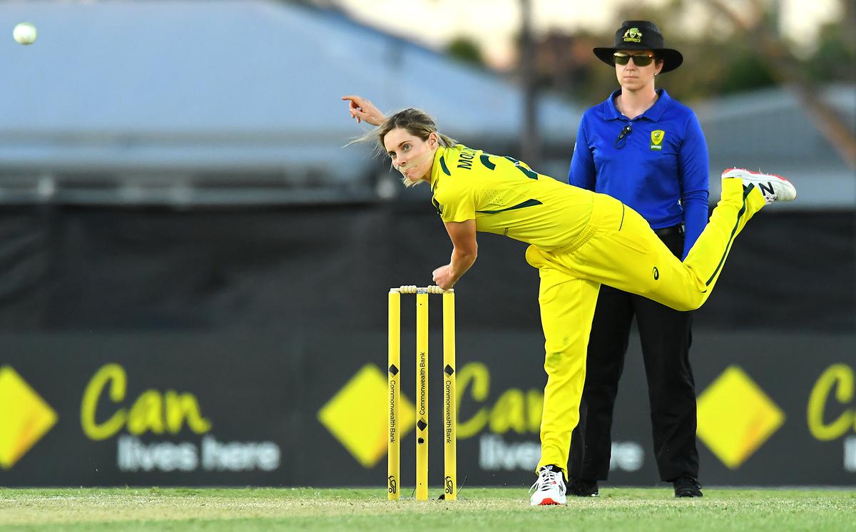 Australia’s Sophie Molineux bowls with her mouth taped during the third ODI against India at Great Barrier Reef Arena on September 26, 2021 in Mackay, Australia. 