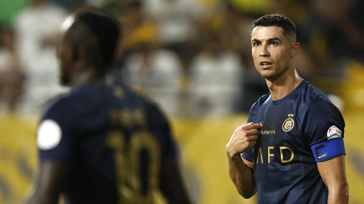 Saudi fans flock to buy Cristiano Ronaldo jersey after Al Nassr deal - in  pictures