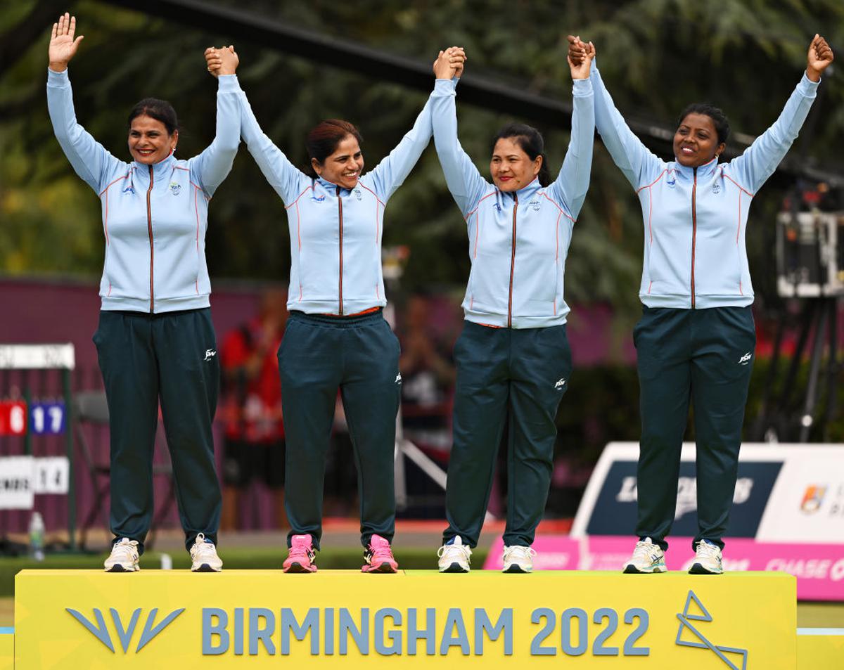 The Indian women’s Lawn Bowls fours team, Lovely Choubey, Pinki, Nayanmoni Saikia and Rupa Rani Tirkey, celebrates winning the gold medal at the Birmingham 2022 Commonwealth Games.